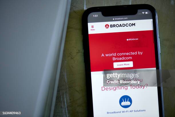 The Broadcom website on a smartphone arranged in New York, US, on Friday, Aug. 18, 2023. Broadcom Inc. Is scheduled to release earnings figures on...