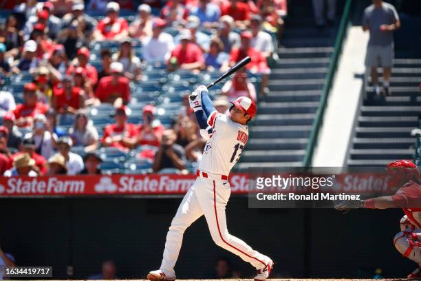 Shohei Ohtani of the Los Angeles Angels hits a two-run home run against the Cincinnati Reds in the first inning during game one of a doubleheader at...