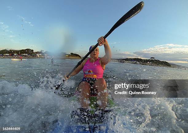 Virginia Carlton of Ocean Grove Lifesaving Club warms up during the Victorian Surf Lifesaving Championships on March 10, 2013 in Anglesea, Australia.