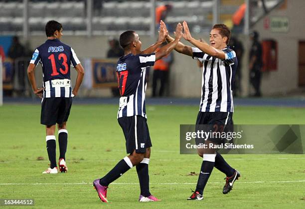 Walter Ibañez of Alianza Lima celebrates a goal during a match between Sporting Cristal and Alianza Lima as part of The 2013 Torneo Descentralizado...