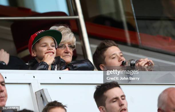 Romeo Beckham, David Beckham's mother Sandra Beckham and Brooklyn Beckham watch the french Ligue 1 match between Paris Saint-Germain FC and AS...