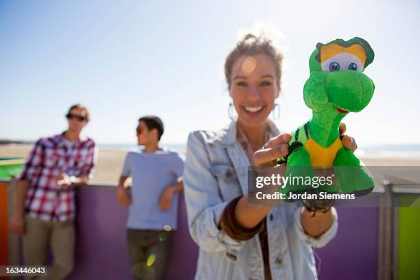 friends enjoying a day at the carnival. - awards day 3 stock pictures, royalty-free photos & images