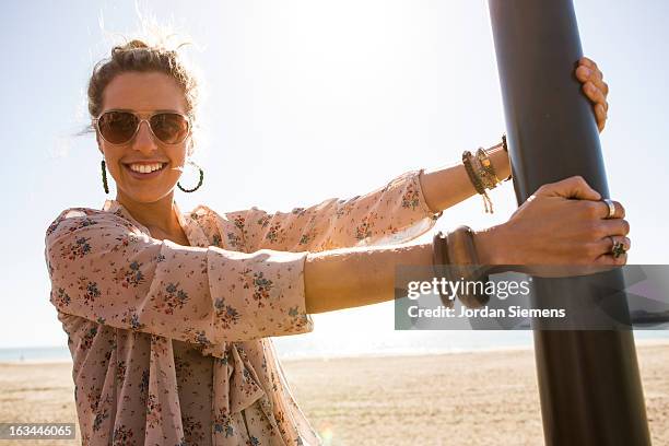 a woman enjoying a day at the carnival. - blouse stockfoto's en -beelden