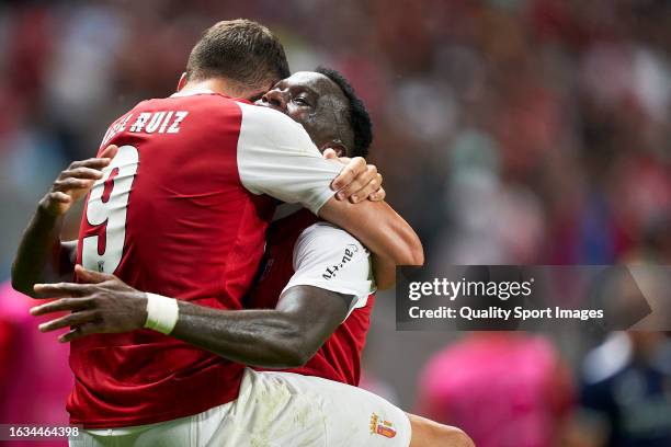 Abel Ruiz of SC Braga celebrates with Armindo Tue Na Bangna 'Bruma' after scoring his team's first goal during the UEFA Champions League Qualifying...