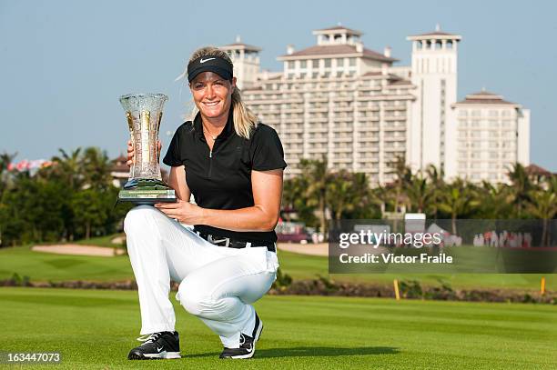 Suzanne Pettersen of Norway poses with the trophy after winning the Mission Hills World Ladies Championship at Mission Hills' Blackstone Course on...