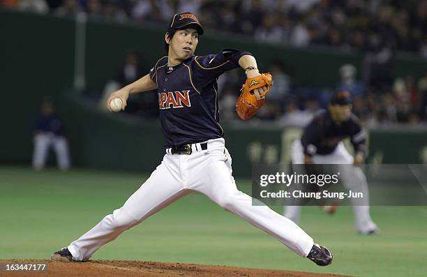 Pitcher Kenta Maeda of Japan pitches in the fifth inning during the World Baseball Classic Second Round Pool 1 game between Japan and the Netherlands...