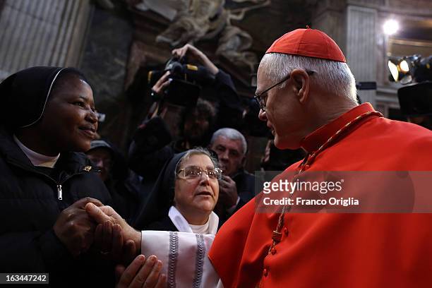 Catholic nun kisses the ring of Brasilian cardinal and Sao Paulo archbishop Odilo Pedro Scherer during Sunday service mass at St. Andrea al Quirinale...