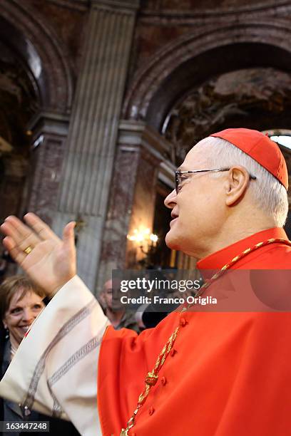 Brasilian cardinal and Sao Paulo archbishop Odilo Pedro Scherer waves to the faithful as he arrives at St. Andrea al Quirinale church to lead a...