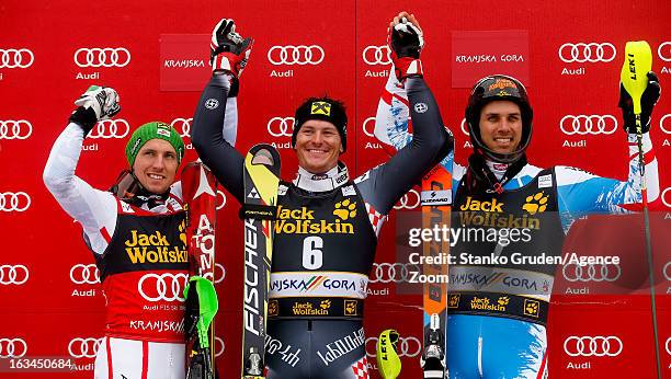 Marcel Hirscher of Austria takes 2nd place, Ivica Kostelic of Croatia takes 1st place, Mario Matt of Austria takes 3rd place during the Audi FIS...