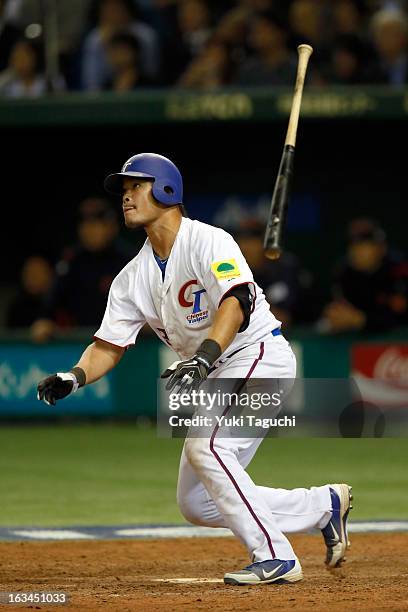 Chih-Sheng Lin of Team Chinese Taipei doubles in the bottom of the eighth inning during Pool 1, Game 2 between Japan and Chinese Taipei in the second...