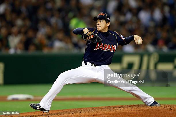 Atsushi Nohmi of Team Japan pitches during Pool 1, Game 2 between Japan and Chinese Taipei in the second round of the 2013 World Baseball Classic at...