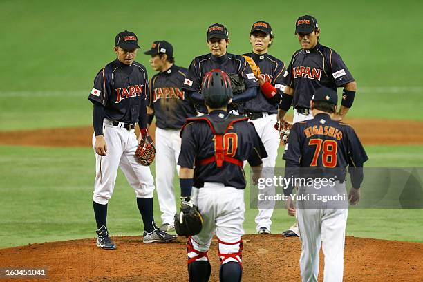 Osamu Higashio of Team Japan visits the mound during Pool 1, Game 2 between Japan and Chinese Taipei in the second round of the 2013 World Baseball...