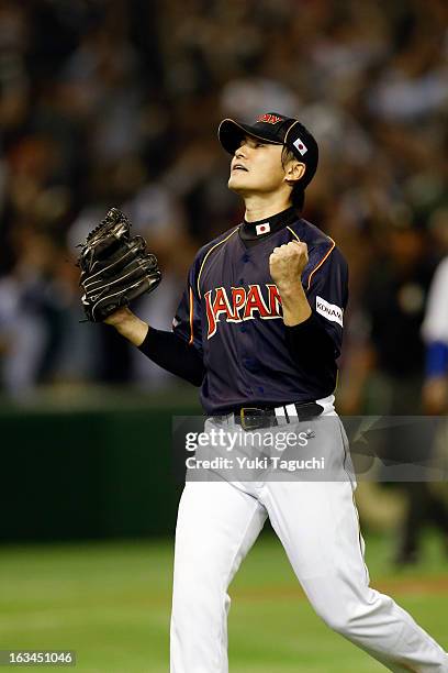 Toshiya Sugiuchi of Team Japan reacts to defeating Team Chinese Taipei in extra innings in Pool 1, Game 2 in the second round of the 2013 World...