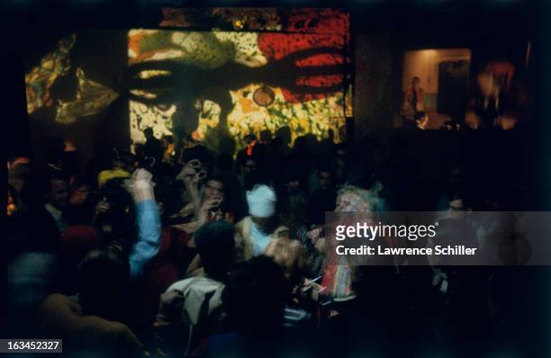 Time-exposure view of dancers under the influence of LSD at an 'Acid Test,' Los Angeles, California, 1966. The 'Acid Tests' were of a series of...