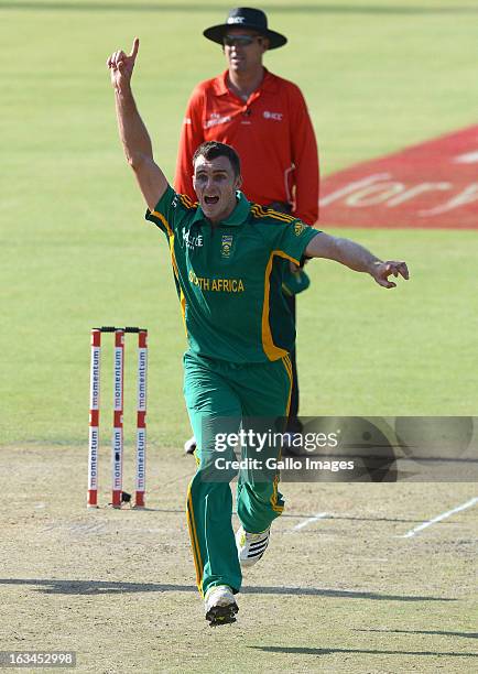 Ryan McLaren of South Africa celebrates the wicket of Misbah-ul-Haq for 38 runs during the 1st One Day International match between South Africa and...