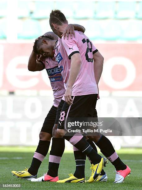 Anselmo De Moraes of Palermo celebrates with team-mates after scoring the opening goal during the Serie A match between US Citta di Palermo and AC...