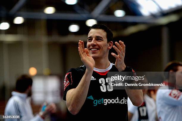 Dominik Klein of Germany celebrates after the DHB International Friendly match between Germany and Switzerland at Conlog-Arena on March 10, 2013 in...