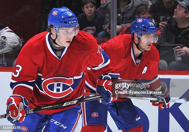 Brendan Gallagher and Andrei Markov of the Montreal Canadiens during the NHL game against the New Jersey Devils on January 27, 2013 at the Bell...