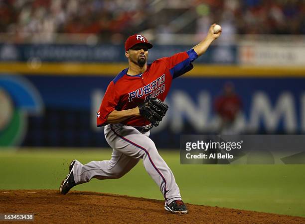 Romero of Puerto Rico in action against Venezuela during the first round of the World Baseball Classic at Hiram Bithorn Stadium on March 9, 2013 in...