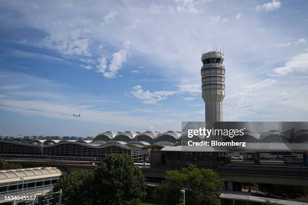 Ronald Reagan National Airport in Arlington, Virginia, US, on Wednesday, Aug. 30, 2023. American Airlines Group Inc. Flight attendants gave their...