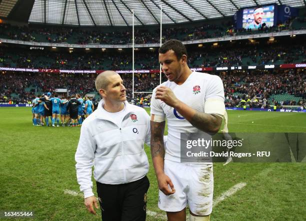 Stuart Lancaster head coach of England congratulates Courtney Lawes of England at the end of the match during the RBS Six Nations match England and...