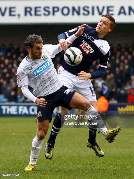 David Bentley of Blackburn Rovers battles with Shane Lowry of Millwall during the FA Cup sponsored by Budweiser sixth round match between Millwall...