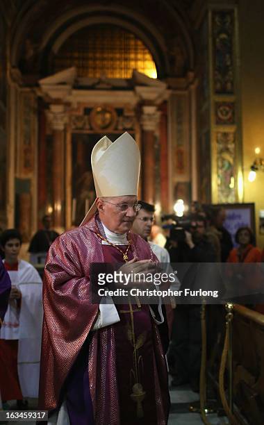 Canadian cardinal Marc Ouellet leads a mass at his Vatican parish church of Santa Maria in Traspontina on March 10, 2013 in Rome, Italy. Cardinals...
