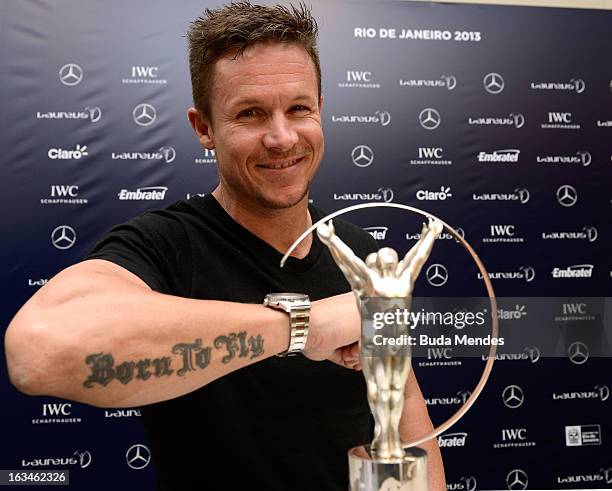 Skydiver Felix Baumgartner talks during a press conference at the Windsor Atlantic Hotel during day 2 of the 2013 Laureus World Sports Awards on...