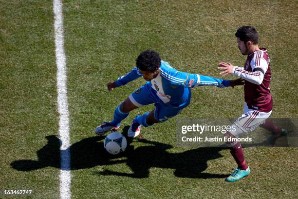 Sheanon Williams of the Philadelphia Union controls the ball against Kevin Harbottle of the Colorado Rapids during the first half at Dick's Sporting...