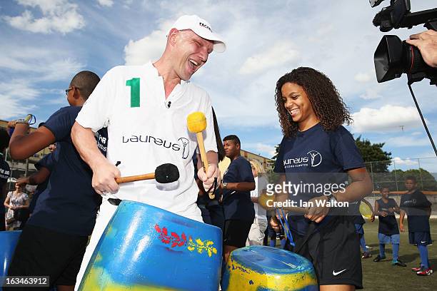 Laureus Ambassador Axel Schulz attends the Mercedes-Benz Sprinter handover to the Bola Project during 2013 Laureus World Sports Awards on March 10,...