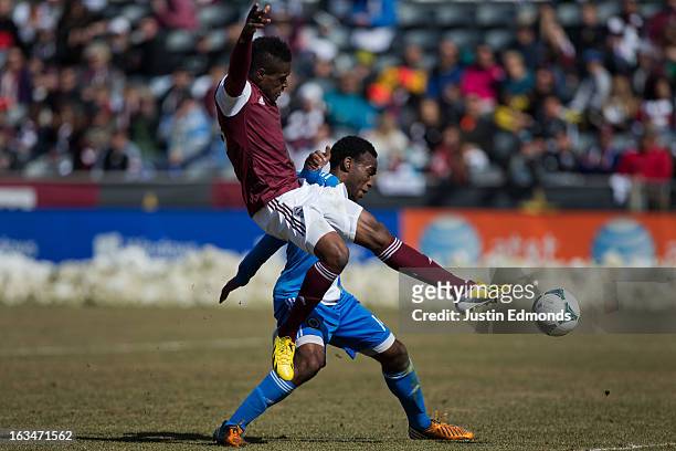 Deshorn Brown of the Colorado Rapids battles for the ball with Amobi Okugo of the Philadelphia Union during the second half at Dick's Sporting Goods...