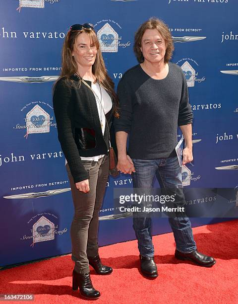 Janie Liszewski and guitarist Eddie Van Halen attend the John Varvatos 10th Annual Stuart House Benefit presented by Chrysler, Kids Tent by Hasbro...