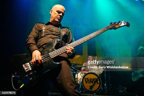 Craig Adams of The Alarm performs on stage at Leeds O2 Academy on March 10, 2013 in Leeds, England.