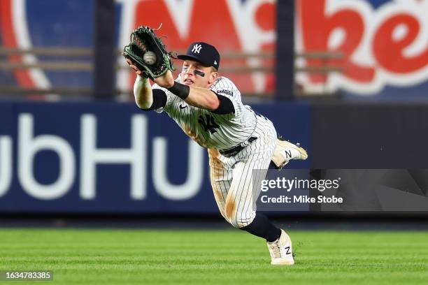 Harrison Bader of the New York Yankees catches a fly ball off the bat of Lane Thomas of the Washington Nationals in the sixth inning at Yankee...