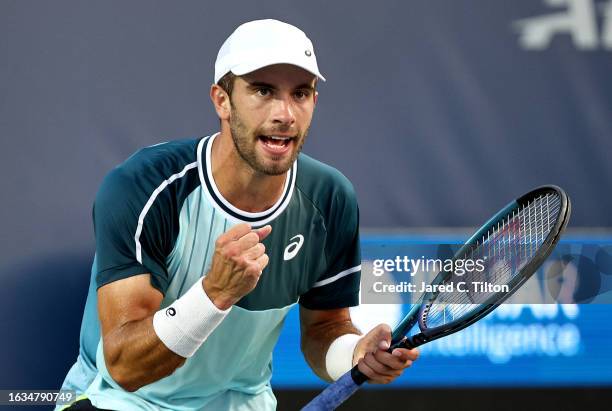 Borna Coric of Croatia reacts following a point against Michael Mmoh of the United States during their third round match of the Winston-Salem Open at...