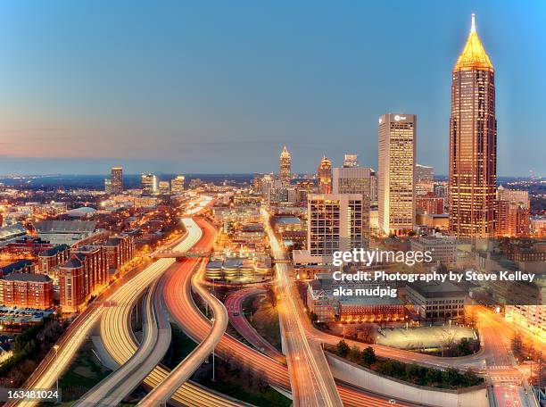 the lights and traffic of atlanta - atlanta traffic stock pictures, royalty-free photos & images