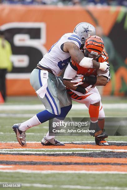 Anthony Spencer of the Dallas Cowboys makes the tackle during the game against the Cincinnati Bengals at Paul Brown Stadium on December 9, 2012 in...