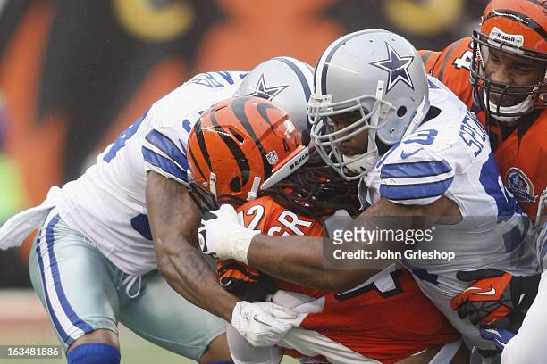 Anthony Spencer of the Dallas Cowboys makes the tackle during the game against the Cincinnati Bengals at Paul Brown Stadium on December 9, 2012 in...