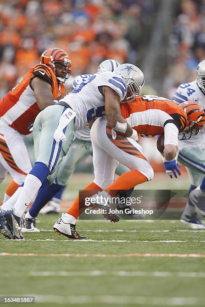 Anthony Spencer of the Dallas Cowboys makes the tackle during the game against the Cincinnati Bengals at Paul Brown Stadium on December 9, 2012 in...