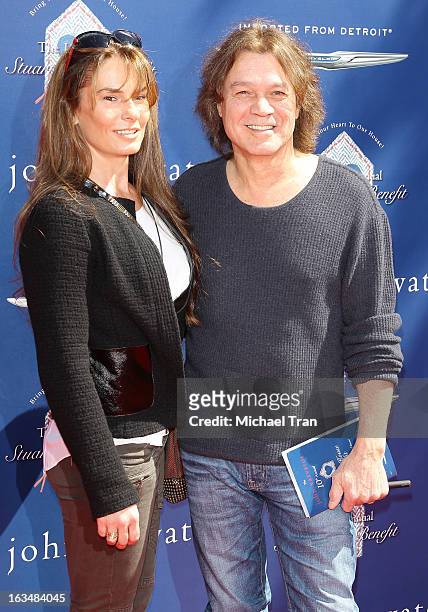 Edward Van Halen and Janie Liszewski arrive at The John Varvatos 10th Annual Stuart House Benefit held on March 10, 2013 in Los Angeles, California.