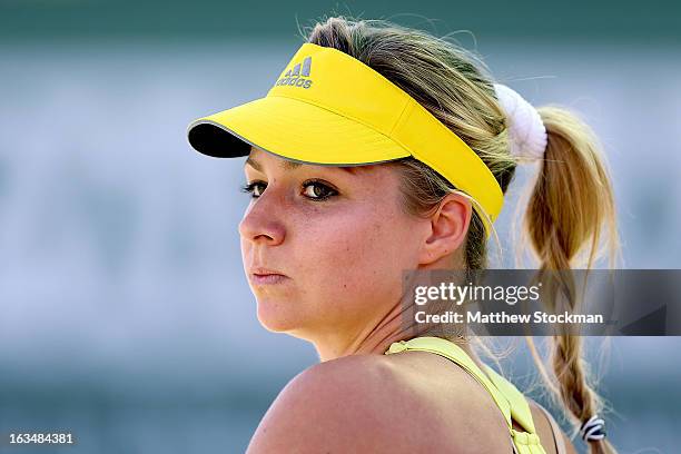 Maria Kirilenko of Russia cools down between games while playing Mallory Burdette during the BNP Paribas Open at the Indian Wells Tennis Garden on...