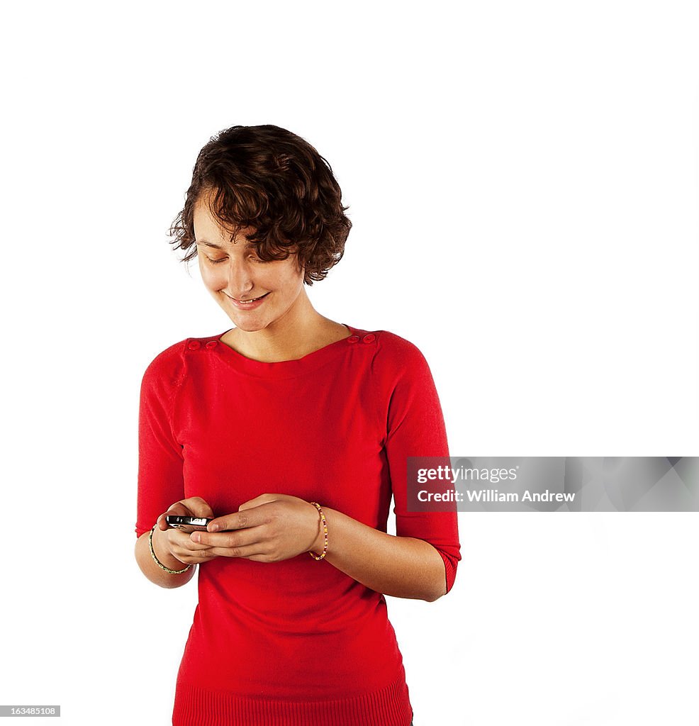 Woman texting on a smartphone