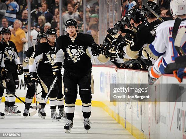 James Neal of the Pittsburgh Penguins celebrates his goal with the bench during the game against the New York Islanders on March 10, 2013 at Consol...
