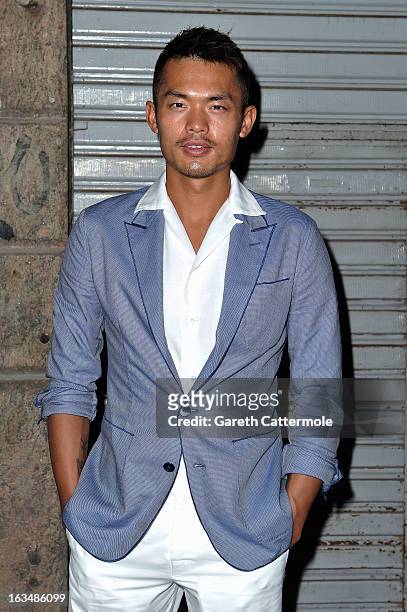 Badminton player Lin Dan attends the Laureus Welcome Party at the Rio Scenarium during the 2013 Laureus World Sports Awards on March 10, 2013 in Rio...