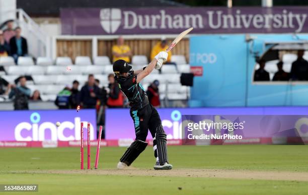 Brydon Carse of England takes the wicket of Adam Milne of New Zealand during the Mens International T20 Match match between England and New Zealand...