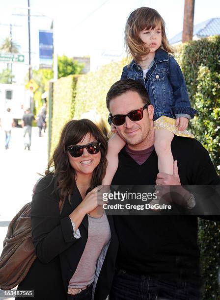 Actress Tiffani Thiessen, husband Brady Smith and daughter Harper arrive at John Varvatos 10th Annual Stuart House Benefit at John Varvatos Los...