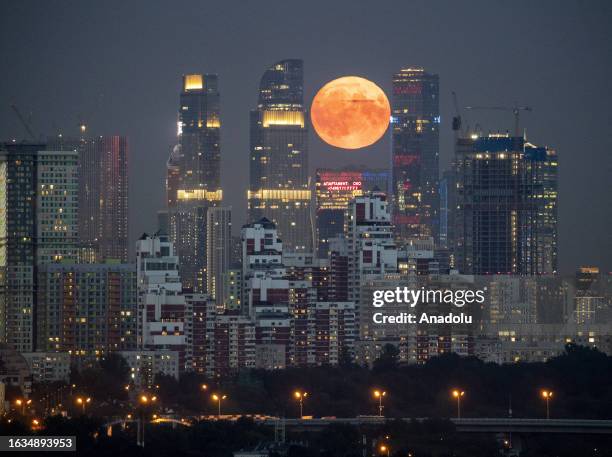 Rare Super Moon rises over the capital city on August 30, 2023 in Moscow, Russia. The rare super moon is an occurrence which will not happen again...