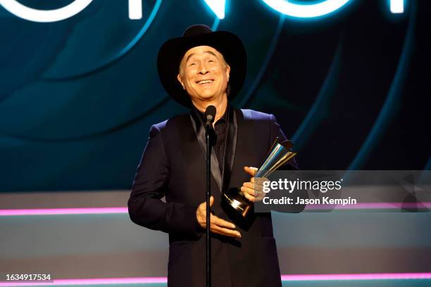 Clint Black accepts the ACM Poet's Award onstage during the 16th Annual Academy of Country Music Honors at Ryman Auditorium on August 23, 2023 in...