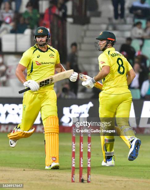 Mitchell Marsh and Tim David of Australia during the 1st KFC T20 International match between South Africa and Australia at Hollywoodbets Kingsmead...