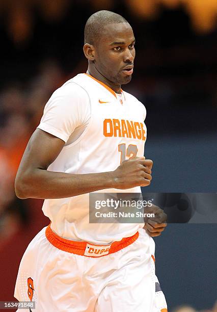 Baye Moussa-Keita of the Syracuse Orange runs on the court during the game against the DePaul Blue Demons at the Carrier Dome on March 6, 2013 in...